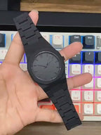 Black Minimalist Analog Wrist Aura Watch With Stainless Steel Strap And Butterfly Lock